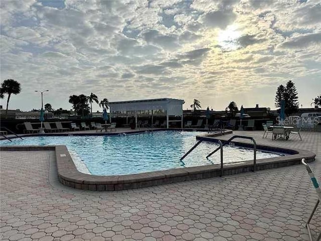 community pool featuring a patio area