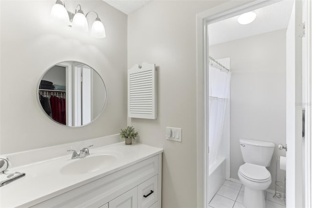 bathroom featuring vanity, tile patterned floors, toilet, and shower / bath combo