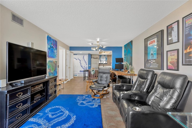 tiled living area with visible vents and a textured ceiling