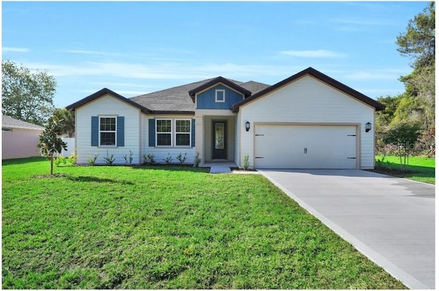 17526 SW 25th Cir, Ocala, FL 34473 - single story home with an attached garage, concrete driveway, a front lawn, a shingled roof, and board and batten siding