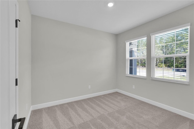 17526 SW 25th Cir, Ocala, FL 34473 - unfurnished room with light carpet