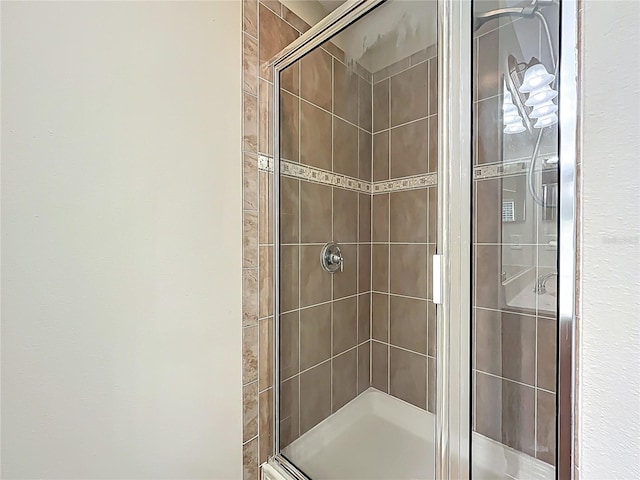 bathroom with a stall shower