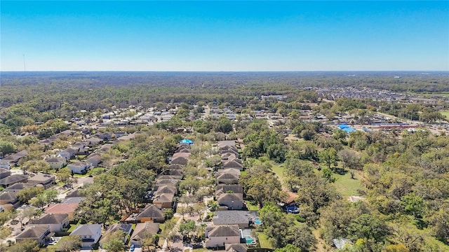 birds eye view of property with a residential view