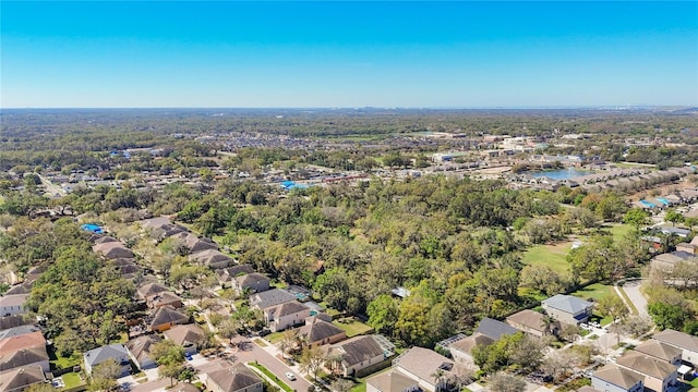 bird's eye view with a residential view and a water view