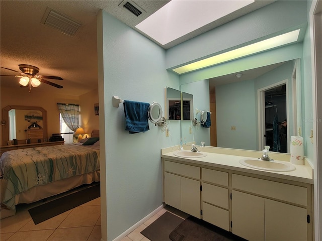 full bathroom featuring a sink, visible vents, and ensuite bath