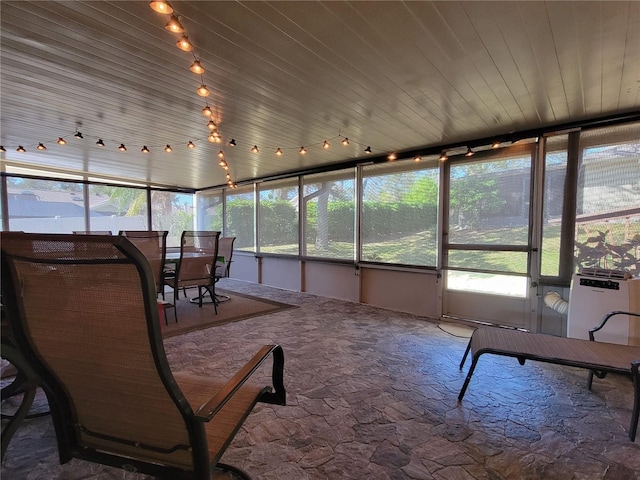 sunroom / solarium with wooden ceiling