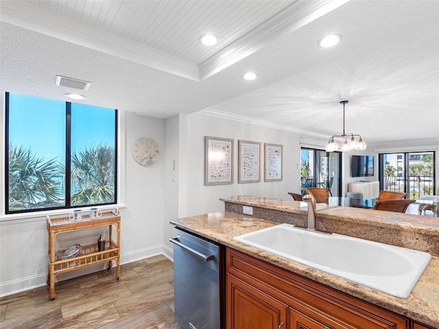 kitchen featuring visible vents, crown molding, dishwasher, brown cabinetry, and a sink