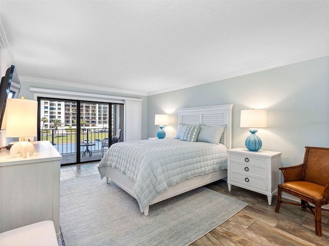 bedroom with access to exterior, light wood finished floors, and ornamental molding