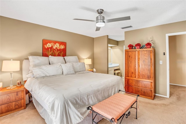 bedroom with a ceiling fan, light colored carpet, visible vents, and baseboards