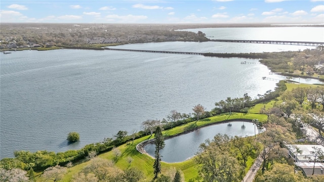 birds eye view of property featuring a water view