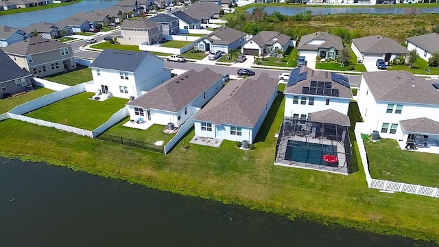 aerial view with a residential view and a water view