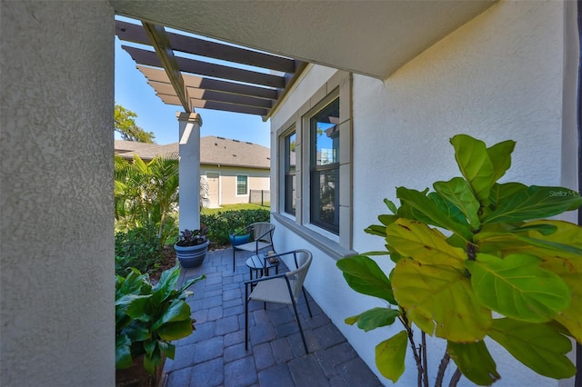 view of patio featuring a pergola