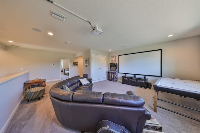 cinema room featuring carpet flooring, recessed lighting, visible vents, and baseboards