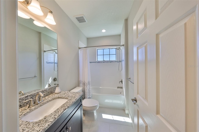 bathroom with vanity, visible vents, tile patterned flooring, shower / tub combo, and toilet