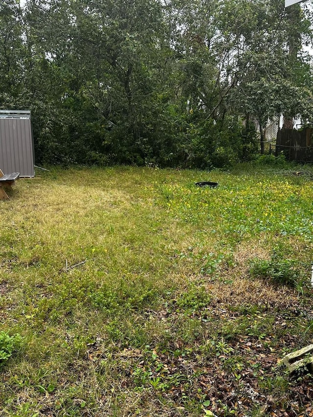 view of yard with fence