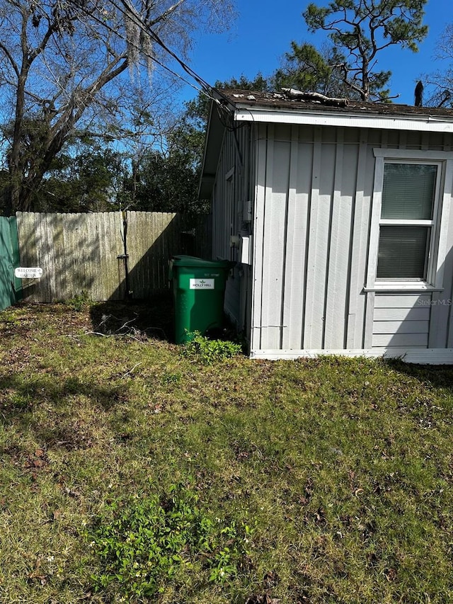 view of outdoor structure featuring fence