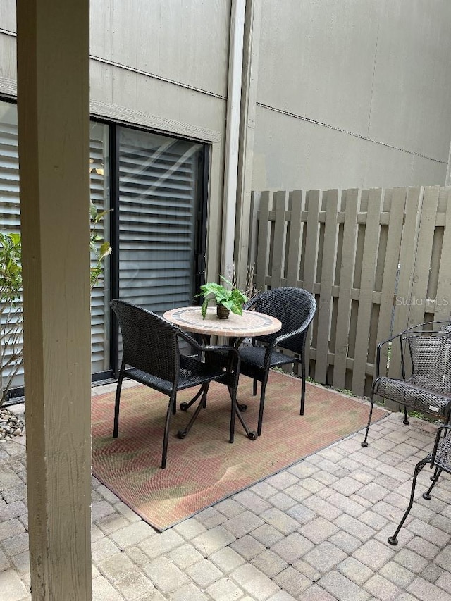 view of patio / terrace with fence