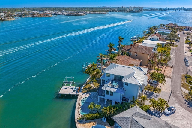 birds eye view of property featuring a water view