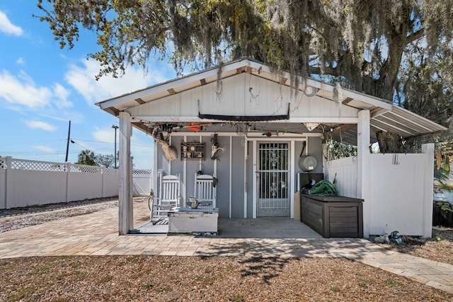 exterior space featuring a patio and fence