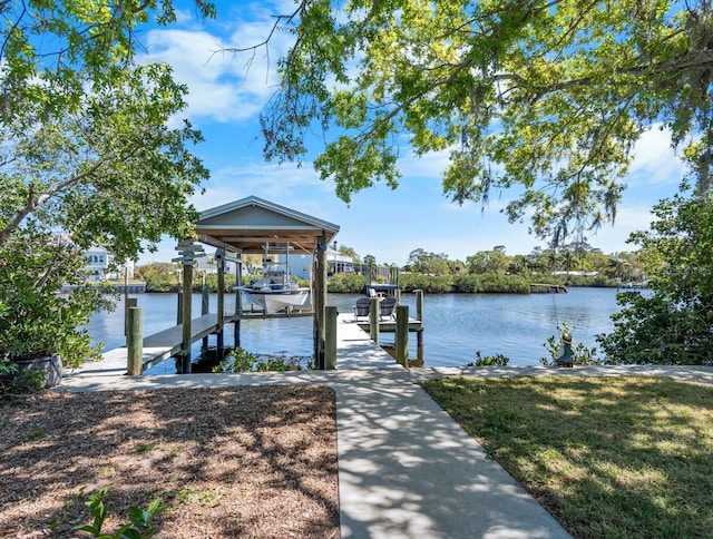 view of dock featuring a water view and boat lift