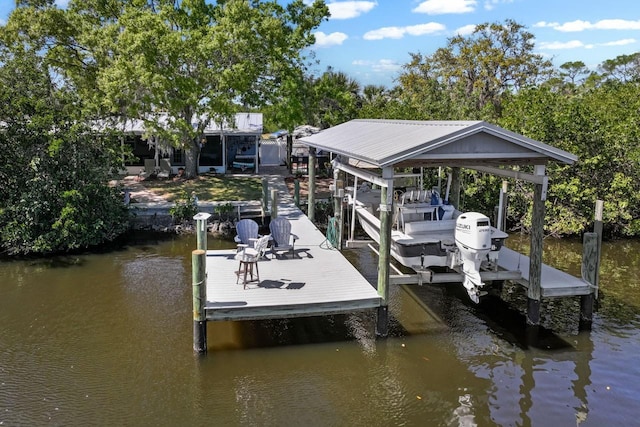 dock area featuring a water view and boat lift