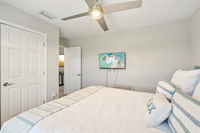 bedroom featuring visible vents and ceiling fan