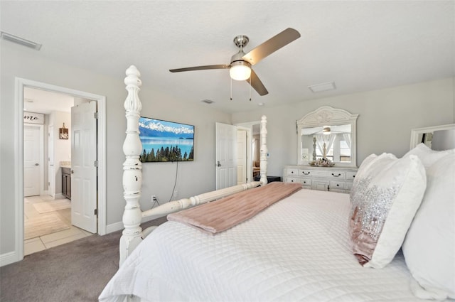 bedroom featuring light carpet, visible vents, baseboards, and ceiling fan