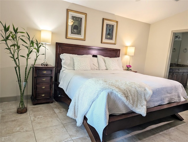 bedroom with light tile patterned floors and vaulted ceiling