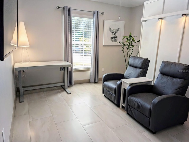 living area featuring light tile patterned floors