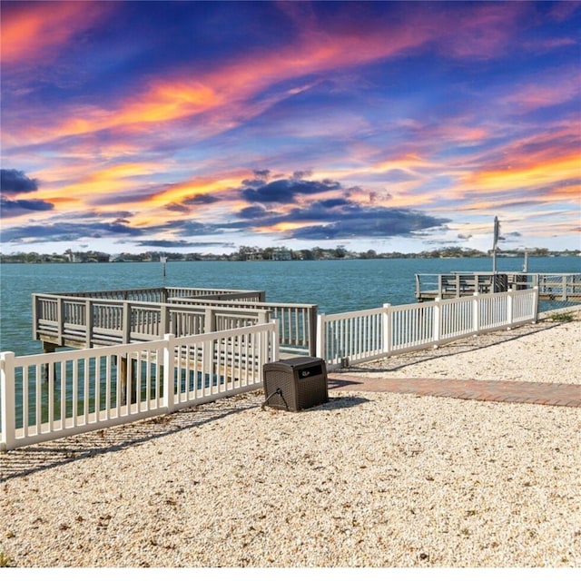 dock area featuring a water view