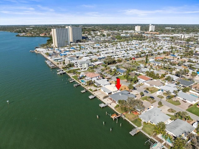 birds eye view of property featuring a water view