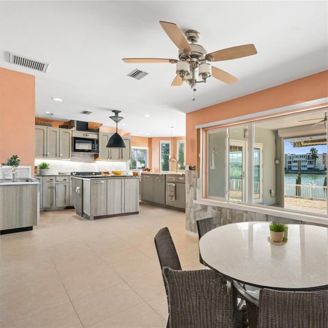 dining area featuring light tile patterned floors, ceiling fan, recessed lighting, and visible vents