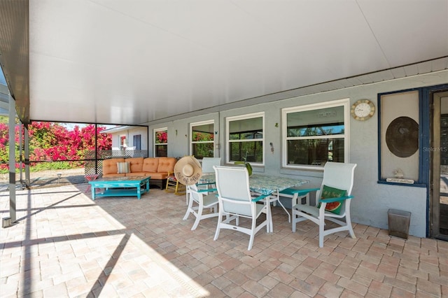 view of patio featuring outdoor lounge area and outdoor dining area