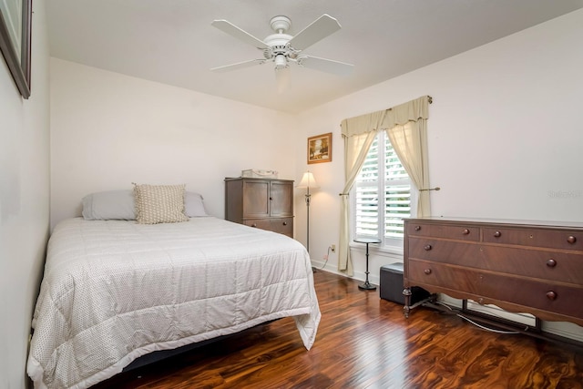 bedroom featuring a ceiling fan and wood finished floors