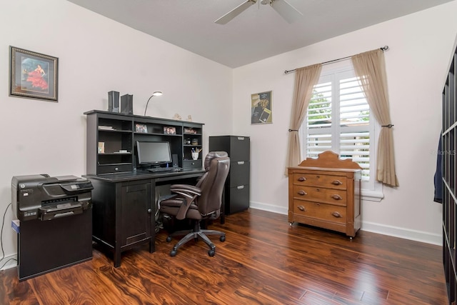 office space with dark wood-style floors, ceiling fan, and baseboards