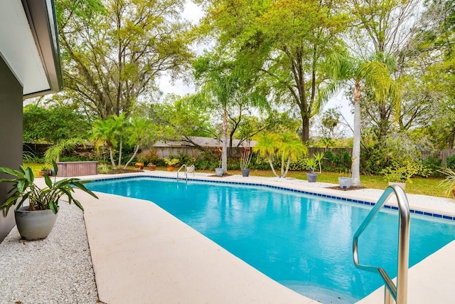 view of pool featuring a fenced in pool, a patio, and a fenced backyard