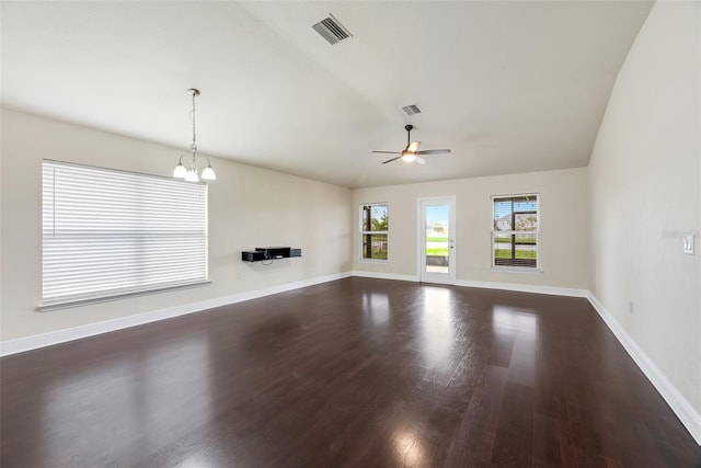 unfurnished living room featuring lofted ceiling, visible vents, dark wood-style flooring, and baseboards