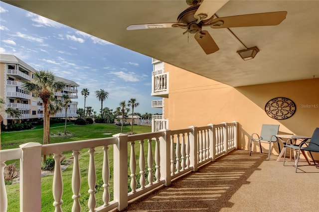 balcony featuring ceiling fan