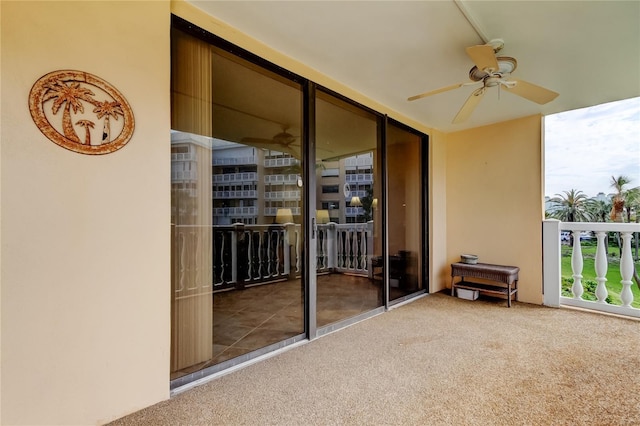 balcony featuring ceiling fan