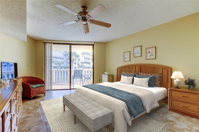 bedroom with floor to ceiling windows, a textured ceiling, ceiling fan, and access to outside