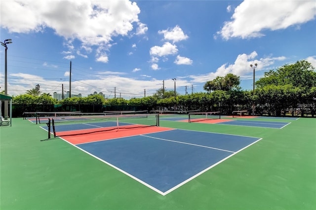 view of sport court with community basketball court and fence