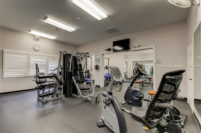 gym featuring visible vents and baseboards