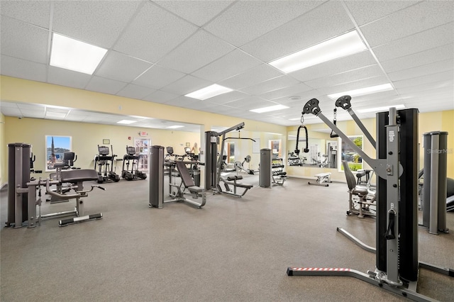 workout area featuring a drop ceiling