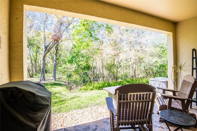 view of patio / terrace featuring area for grilling and central AC unit