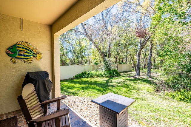 view of yard featuring a patio area and fence