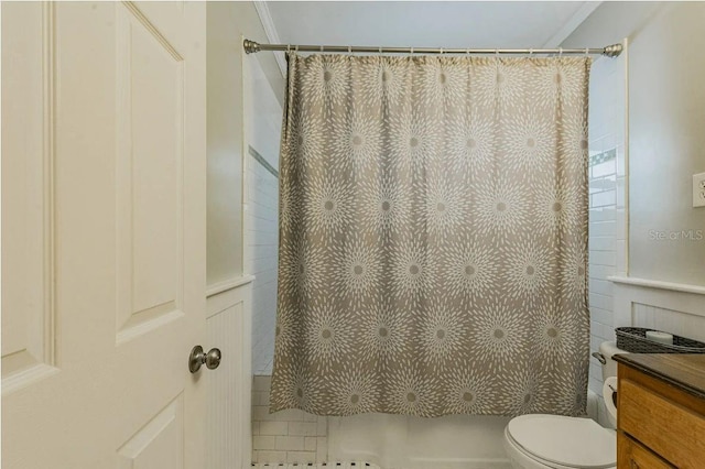 bathroom featuring vanity, a shower with shower curtain, and toilet