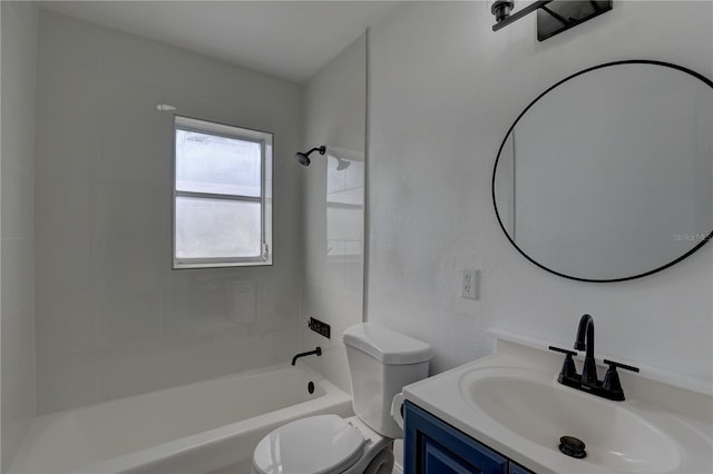 bathroom featuring vanity, shower / bathing tub combination, and toilet