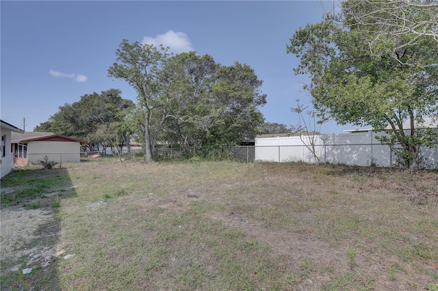 view of yard featuring fence