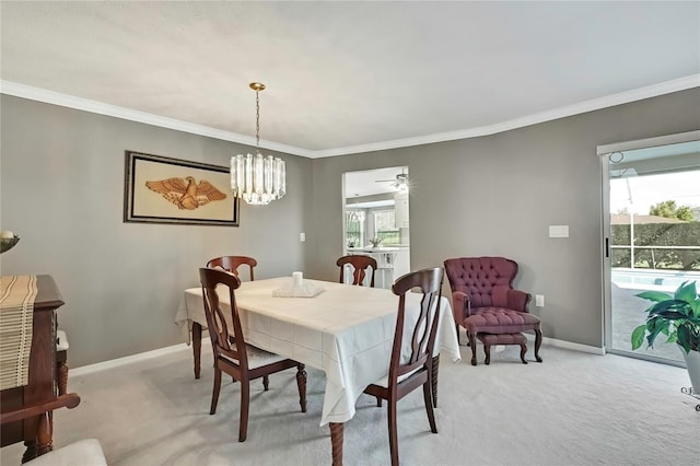 3943 W Fieldwood Ct, Lecanto, FL 34461 - dining room featuring light carpet, healthy amount of natural light, baseboards, and crown molding