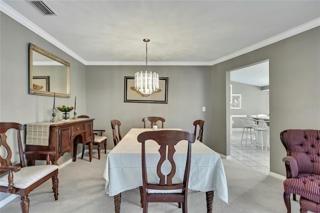 3943 W Fieldwood Ct, Lecanto, FL 34461 - dining area with carpet flooring, ornamental molding, a chandelier, and baseboards